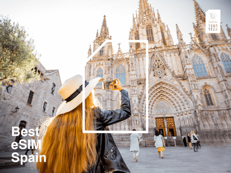 best esim spain - traveller using phone in Barcelona