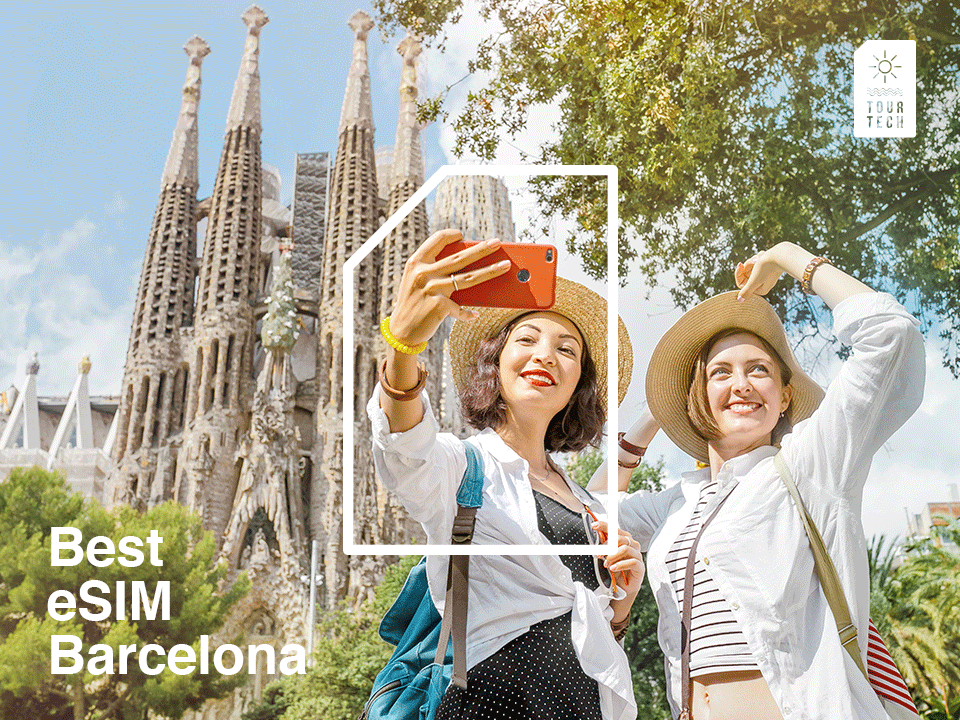 Tourist using a phone with eSIM in Barcelona, Sagrada Familia